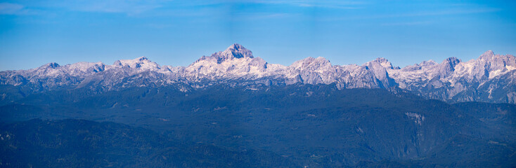 Panoramic view of the Julian Alps with Slovenia's highest mountain Triglav in the center on the autumn afternoon