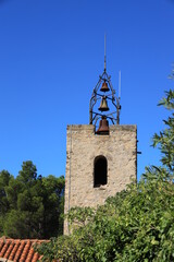 Bell tower of Saint-Julien-et-Sainte-Basilisse church in Cucugnan, Aude department, France