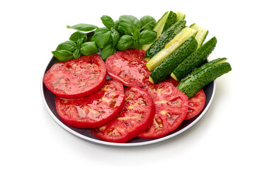 Sliced Tomatoes with Basil Leaves, Caprese salad, isolated on white background
