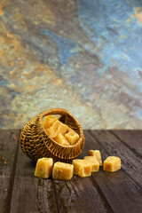 organic jaggery cubes in basket