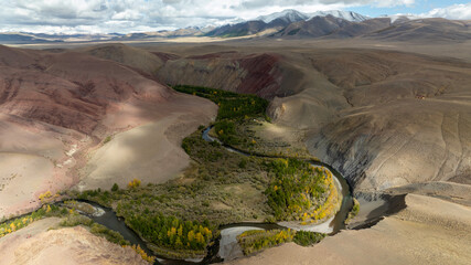 Unreal, ethereal landscapes of lakes and rivers on a sunny autumn day in the Altai foothills, captured by a drone