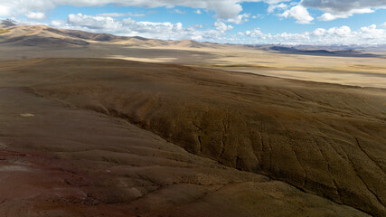 Unreal, ethereal landscapes of lakes and rivers on a sunny autumn day in the Altai foothills, captured by a drone