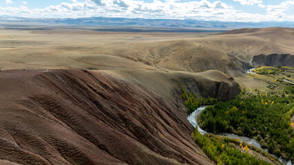 Unreal, ethereal landscapes of lakes and rivers on a sunny autumn day in the Altai foothills, captured by a drone
