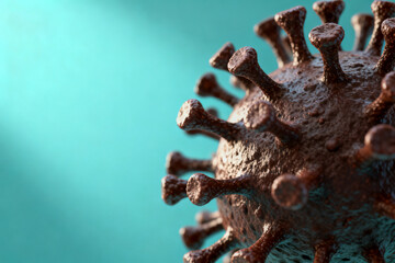 Close-up visualization of a virus particle with surface spike proteins against a teal background