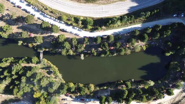 Aerial view of winding asphalt mountain road among green trees in summer. (Domani&ccedil;,İneg&ouml;l dağ yolu)	