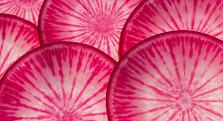 Radish sliced thinly, macro detail of pink and white rings
