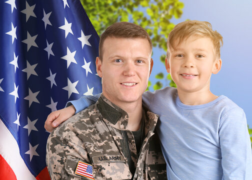 Military man and his son outdoors against national flag of USA - Powered by Adobe
