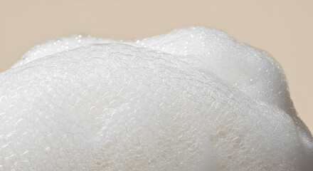 Obraz premium Close-up of fluffy white soap foam creating a clean and pristine texture