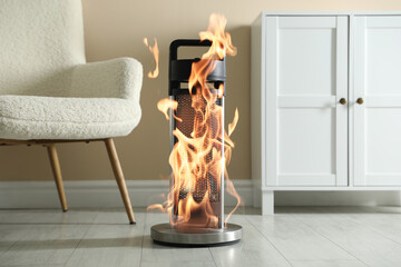 Burning heater in room, flames all over device. Do not leave unattended