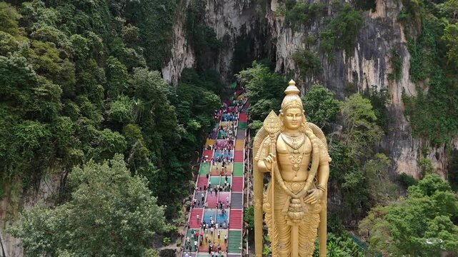 Lord murugan statue and colorful steps at batu caves, malaysia