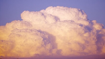 Pastel Cumulus Clouds at Sunset
