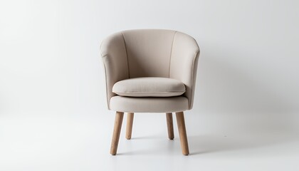 Fototapeta premium A modern beige armchair with smooth upholstery and wooden legs sits against a white background. The minimalist design conveys simplicity and elegance.