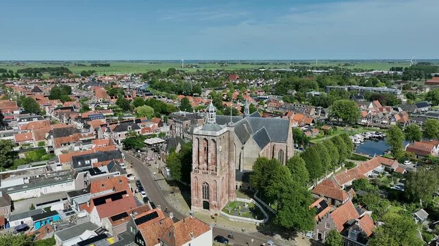 Aerial from the historical town Workum with the Gertrudis church in Friesland the Netherlands
