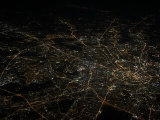 Aerial view of Moscow, Russia, with illuminated streets at night. Aerial view of illuminated night Moscow from the airplane in Russia. 