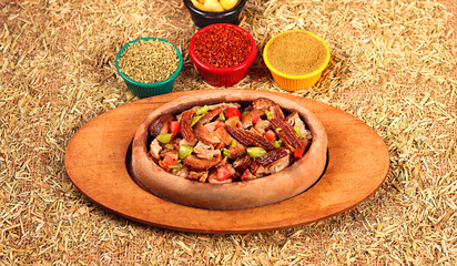 Delicious kokorech served with mixed vegetables