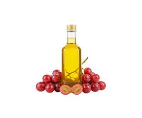 Bottle of grape seed oil and fresh ripe red grapes with seeds isolated on white background.