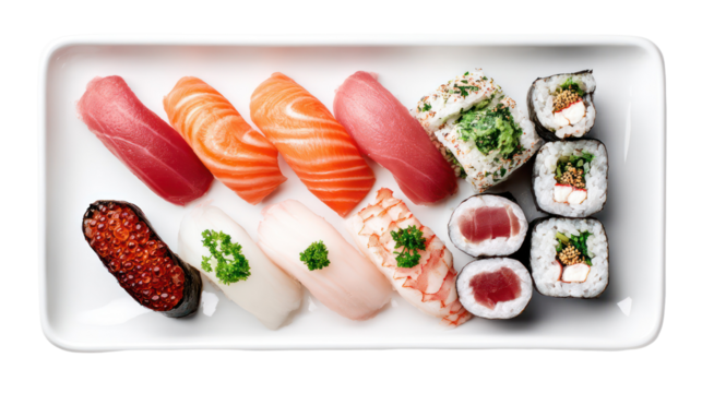 Assortment of fresh sushi and maki rolls on a white platter isolated on transparent background