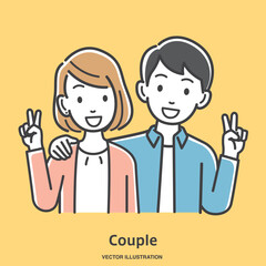 仲が良くピースサインをする若いカップル