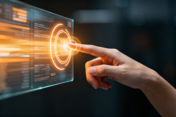 Hand interacting with a futuristic transparent touchscreen interface displaying digital data and glowing circular elements