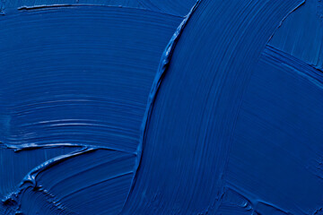 Close-up of blue paint strokes with textured brush marks