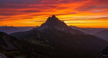Dramatic Alpine Sunset Sky Over Towering Mountain Peak