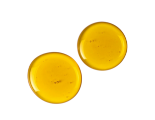 Two round pools of golden liquid, top-down view