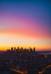 Fototapeta premium City skyline panorama at dusk with colorful sky Gradient