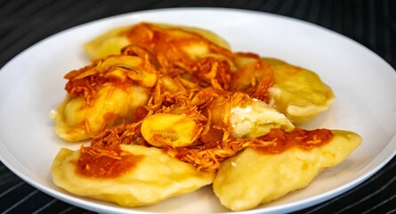 The best, most perfect, and most traditional Ukrainian food, known as perohê or pierog. Typical Christmas food. Mother's food. A fond memory.