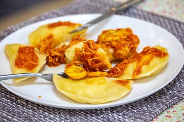 The best, most perfect, and most traditional Ukrainian food, known as perohê or pierog. Typical Christmas food. Mother's food. A fond memory.