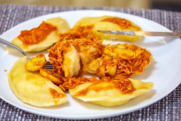 The best, most perfect, and most traditional Ukrainian food, known as perohê or pierog. Typical Christmas food. Mother's food. A fond memory.