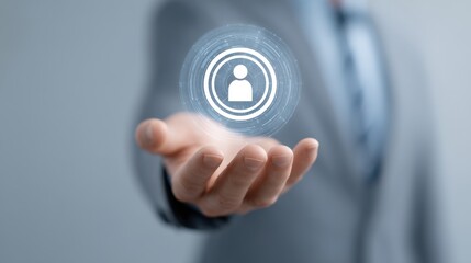 Businessman Reaching Out with Holographic User Icon in Hand, Representing Technology, Innovation, and Digital Identity in the Modern Workplace