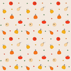 Autumn Pumpkin Seamless Pattern with Fall Leaves on beige background. Ideal for textile design, packaging, decorative materials for Thanksgiving, fall harvest season decoration and autumn holidays