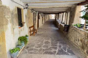 Walking trough the arcades of the medieval town of Pancorbo, in Burgos province, Spain. High quality photography