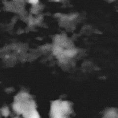 Abstract grunge noise texture background with rough grain pattern, distressed digital surface effect, dynamic chaotic backdrop for design, graphic overlays, and creative artistic projects