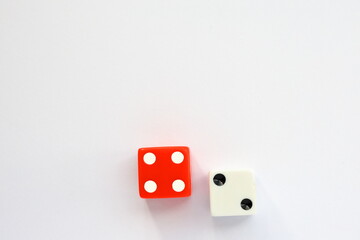 Red and white dice. Casino or luck concept. Above angle shot photography.
