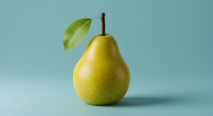 A perfect ripe yellow pear with a stem and a single green leaf, presented as a minimalist still life on a solid blue background