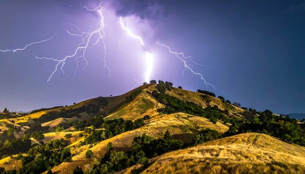 Stormy night over rolling hills