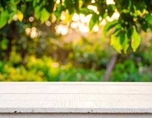 Fototapeta premium Blurred garden background with a white wooden surface