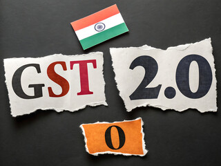 Collage of torn magazine and newspaper cut outs featuring the letter GST 2.0 in different fonts, sizes, and colours. indian flag