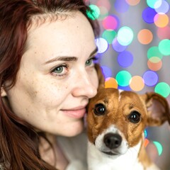 Woman with dog, close-up