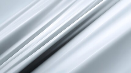 Fototapeta premium Sophisticated and modern abstract background featuring a smooth, silky gray fabric with a minimalist, elegant pattern and a glossy, sleek texture.