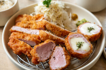 Sous vide pork katsu. Tonkatsu including loin, fillet and cheese katsu. Fried Pork serve on plate in restaurant