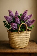 A beautiful floral arrangement of lilac flowers in a woven basket