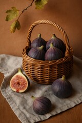 A basket of fresh figs on a wooden table, still life image with warm colors