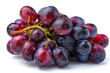 A cluster of red-purple grapes, glistening with water droplets, sits on a white background