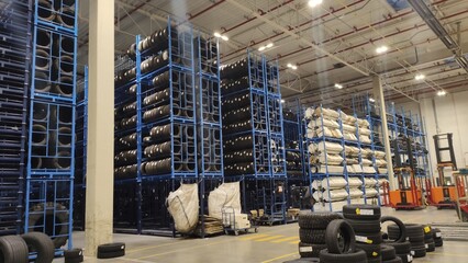 forklift in tire warehouse © Julia