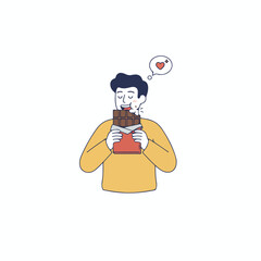 A teenager is enjoying chocolate.