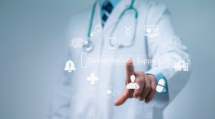 Doctor using digital interface with clinical decision support icons representing healthcare technology medical innovation diagnosis hospital service data analysis and modern treatment