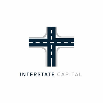 A logo depicting a crossroad intersection of highways forming a plus sign above the words "INTERSTATE CAPITAL".