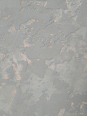 Close-Up of Textured Decorative Plaster Wall Surface Background